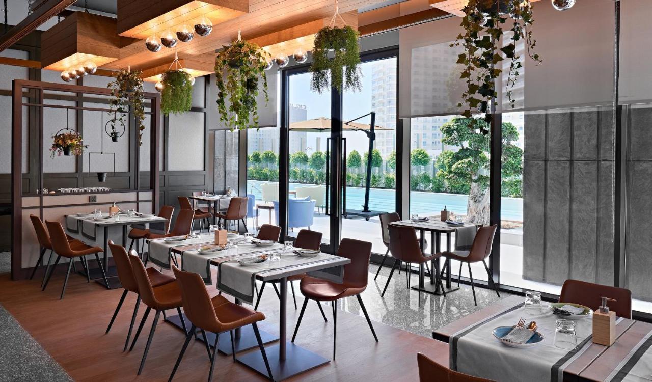 Revier Hotel Дубай Экстерьер фото